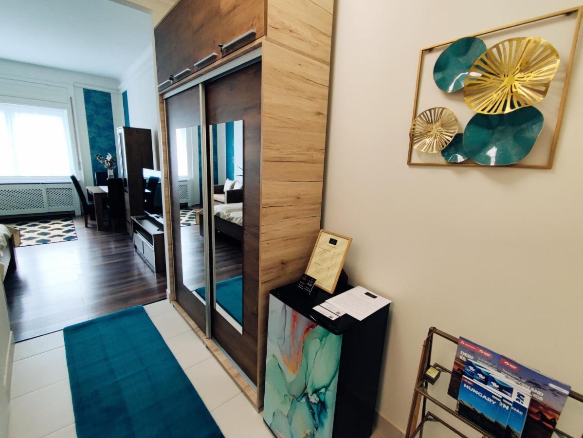 Central Palace Apartman เดเบรตเซน ภายนอก รูปภาพ